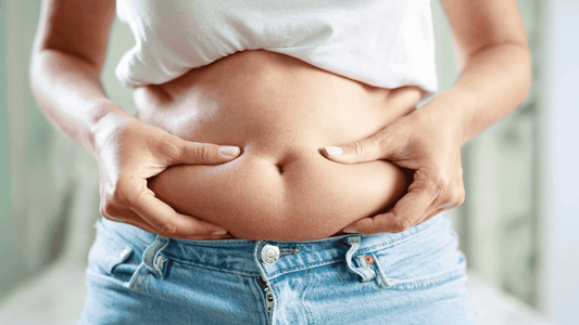 The Real Causes of Belly Fat: Overeating, Hormones, Stress, and Sedentary Living